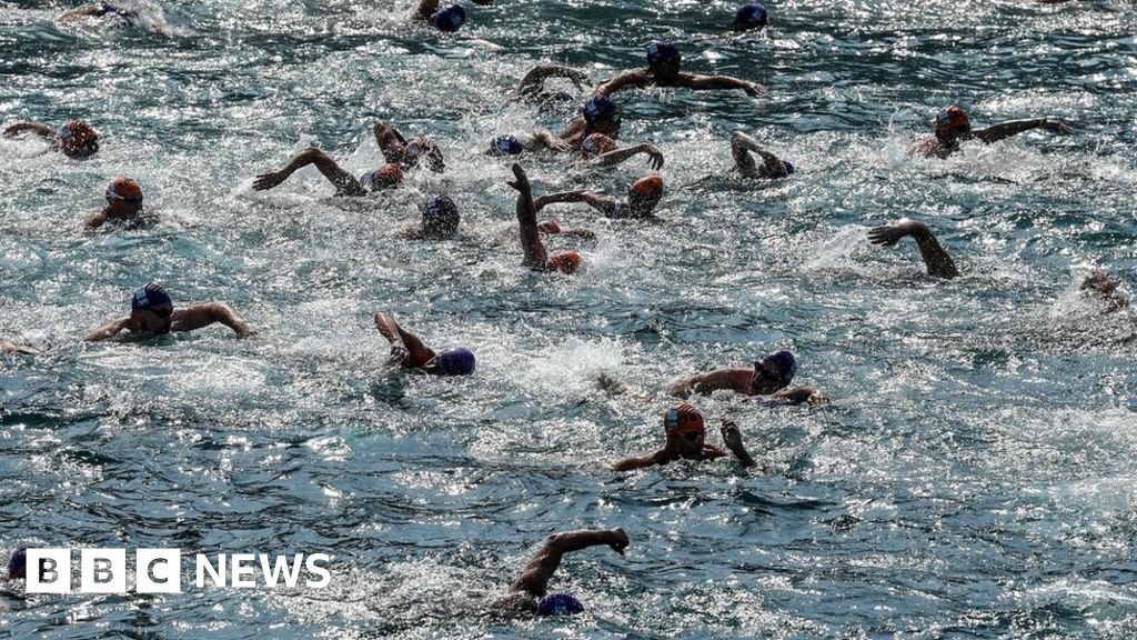 Thousands race in Bosphorus crosscontinental swim BBC News