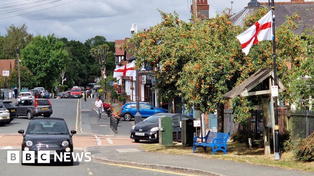 Why have thousands of St George's flags gone up in cities and towns?