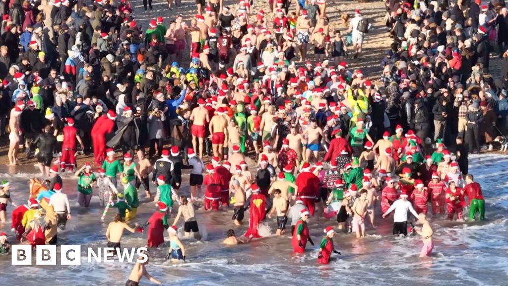 Watch: Hundreds take the plunge at festive sea dip