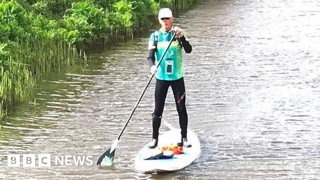 Royal Military Canal: Man, 77, completes paddle board challenge - BBC News