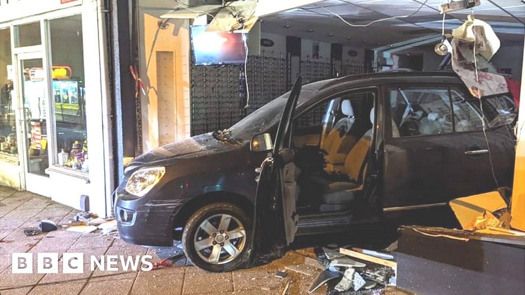 Gorseinon: Girls arrested after crash into opticians