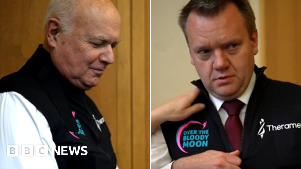 Male MPs wear 'hot flush' vests to simulate menopause BBC News