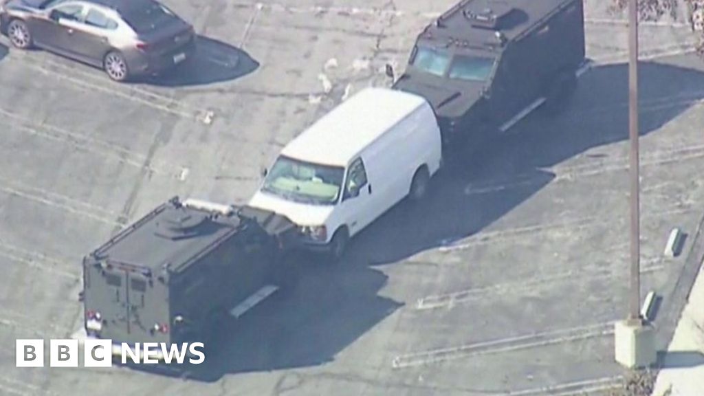 Police surround white van after Monterey Park shooting