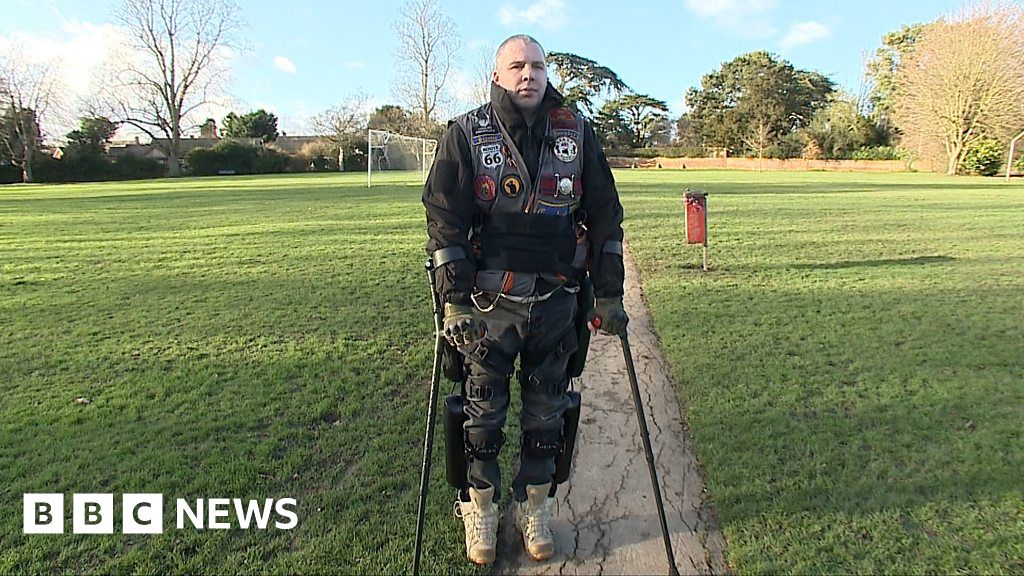 Paralysed war veteran gets 'robotic skeleton' BBC News