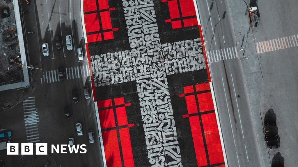 Russian street art covered with asphalt 'by mistake' - BBC News