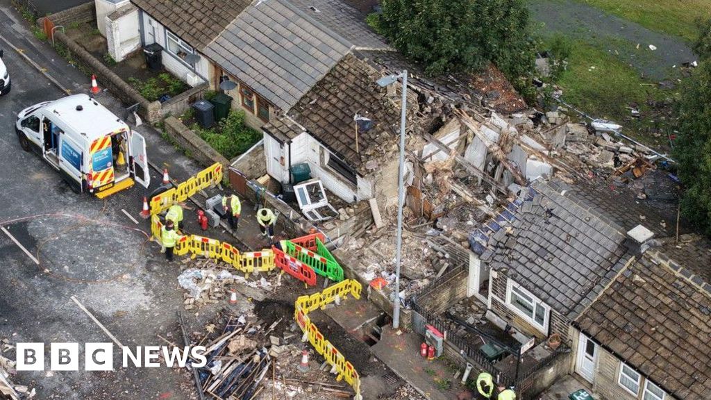 Man on the run after house explosion injures four