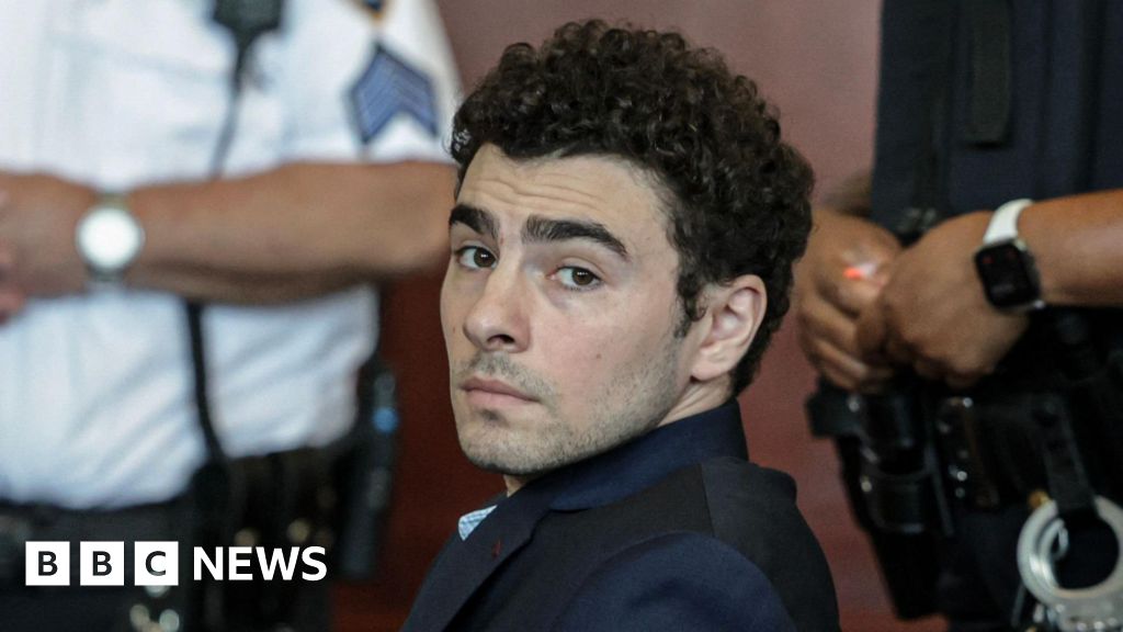 Mangione admits killing healthcare CEO and pleads guilty to federal charges