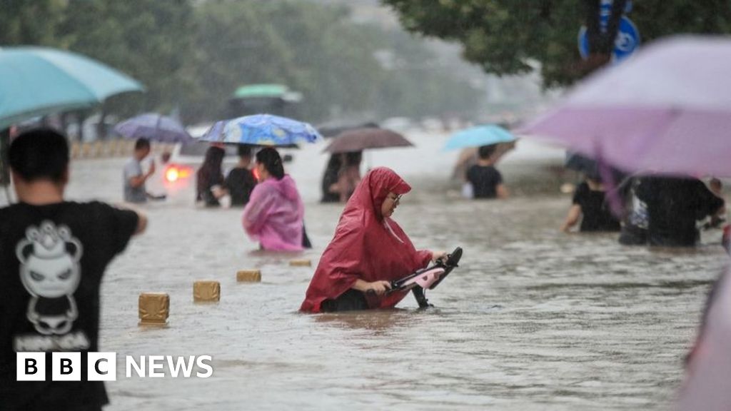 Henan floods: 12 dead in Zhengzhou train and thousands evacuated in China