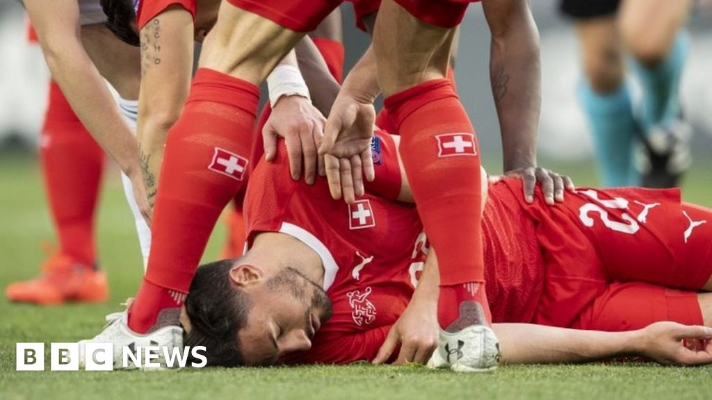 Euro 2020: Georgia opponent rushes to Swiss player's aid