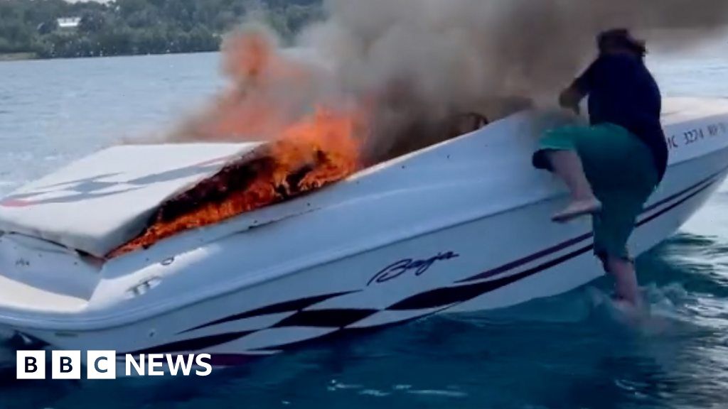 Michigan Two People Saved After Jumping From Burning Boat Bbc News 