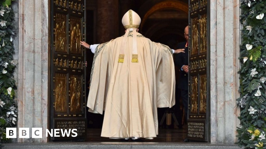 Pope Francis opens St Peter's Holy Door to launch jubilee BBC News