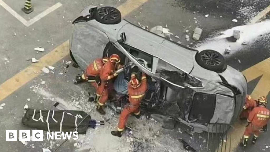 Two killed as Nio electric car falls from third floor office in Shanghai