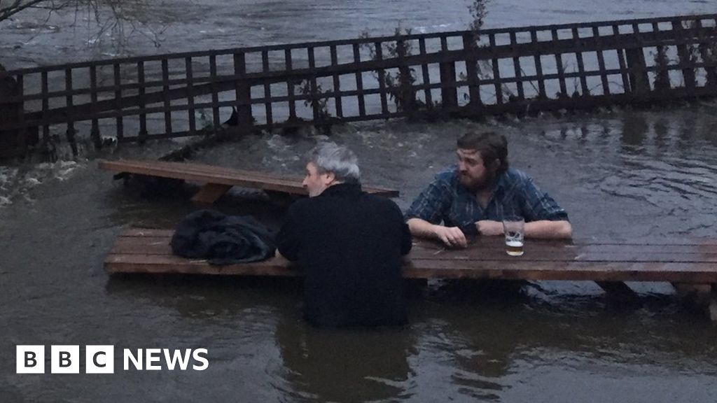 Leeds pub garden floods, men go for pint anyway