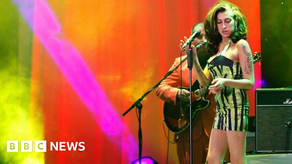 Amy Winehouse: Singer's items raise millions at auction