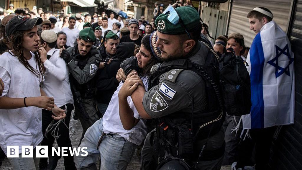 Far-right marchers attack Palestinians as Israel marks taking of Jerusalem