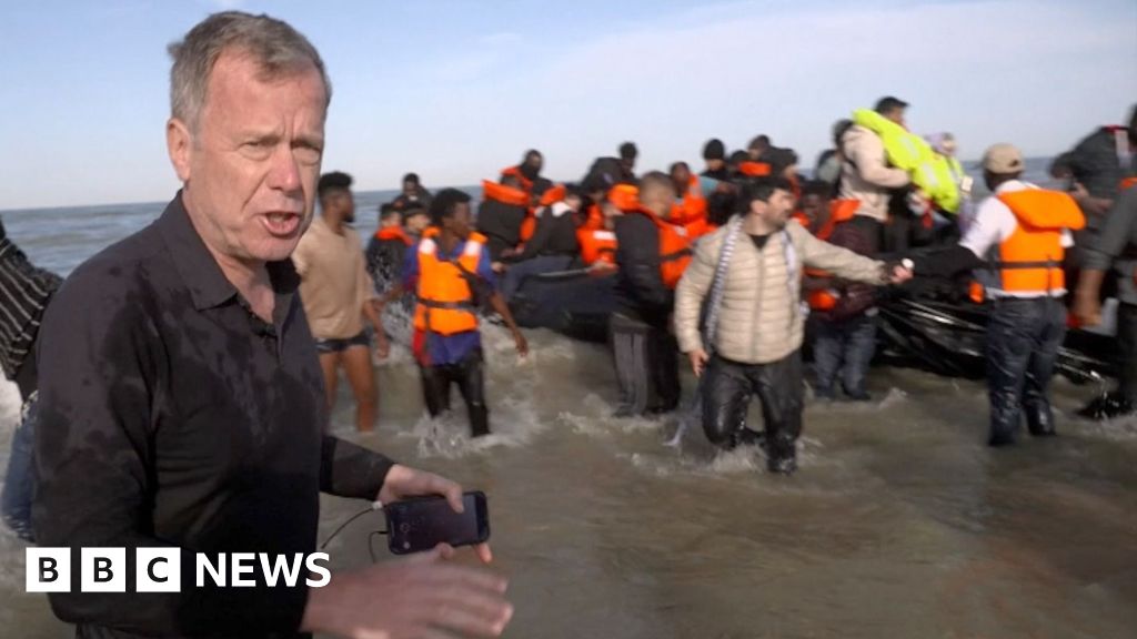 BBC on French beach as police slash migrant ‘taxi-boat’ heading to UK