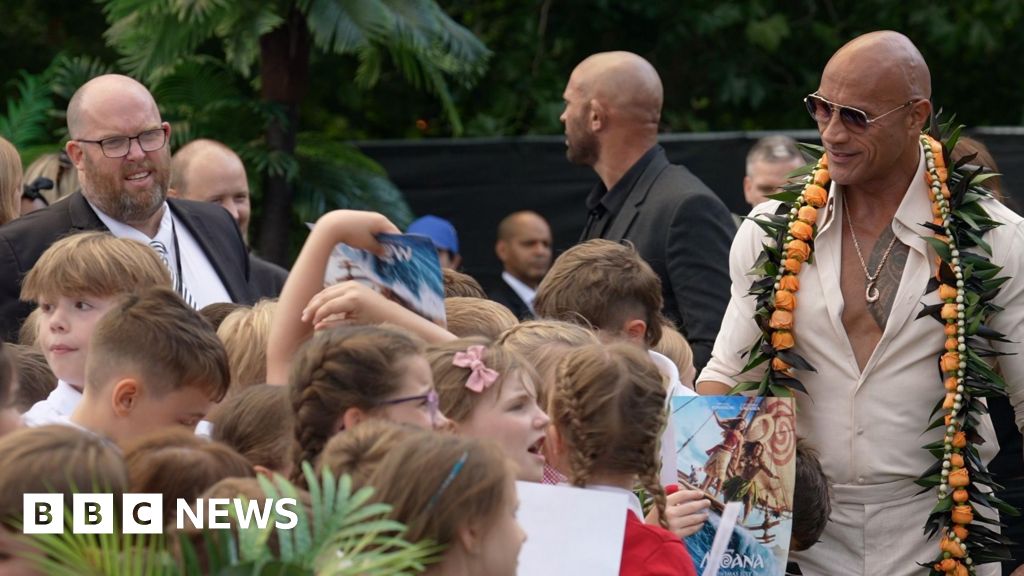 School trip surprise as students meet The Rock