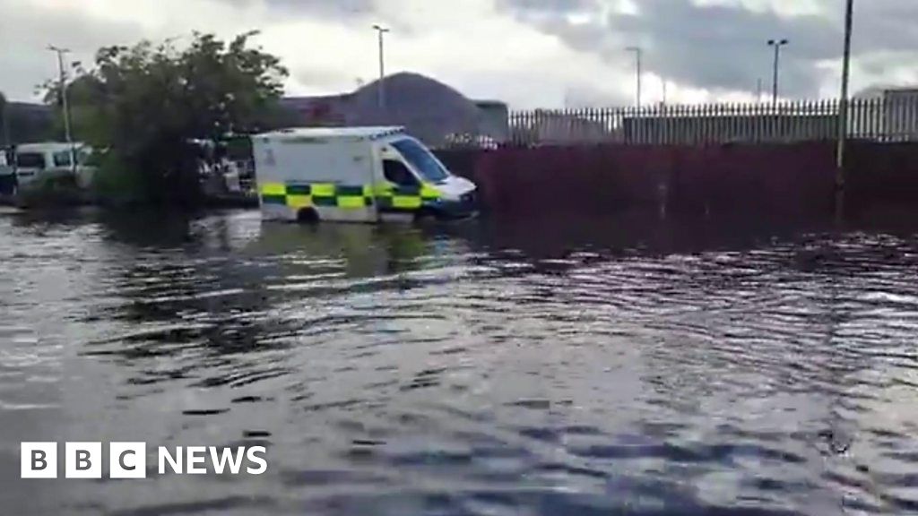 Ambulance battles through flash flooding in Greenock BBC News