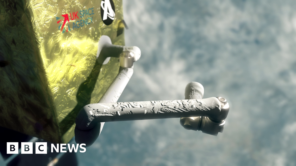 Robot arm would grab defunct British satellite from orbit - BBC News