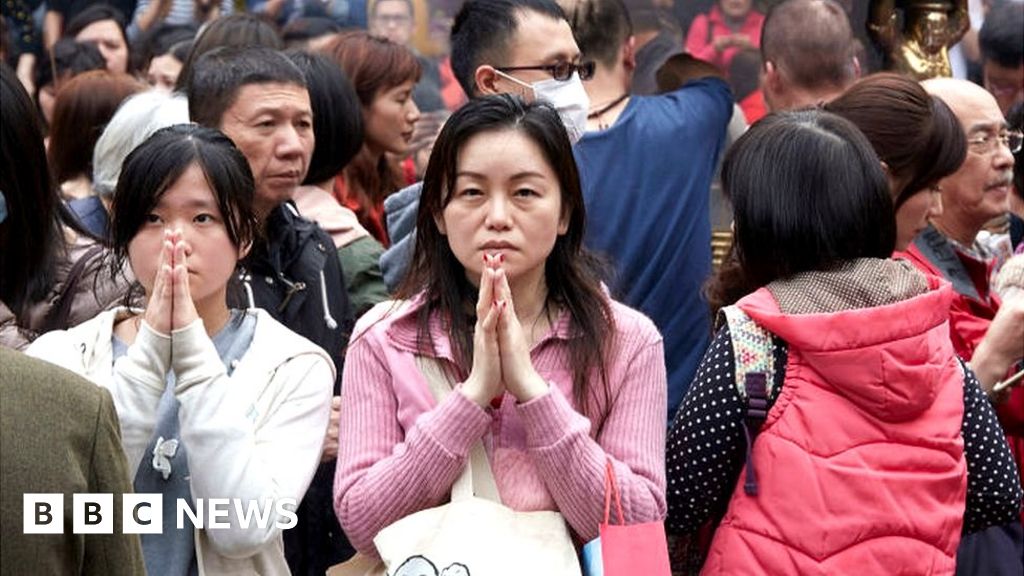 The worshippers caught between China and Taiwan