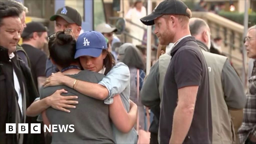 Prince Harry and Meghan hug residents in Pasadena