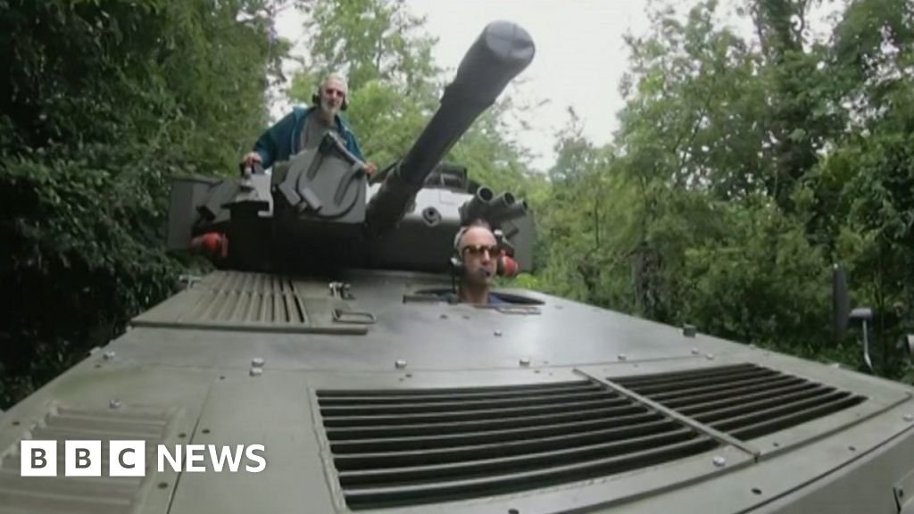 School-run dad picks up sons in restored Scorpion tank