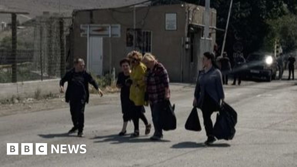 Talk of regime change resonates with Iranians fleeing across border