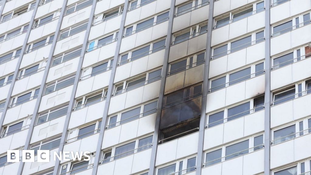 People being treated by paramedics at tower block blaze near Grenfell