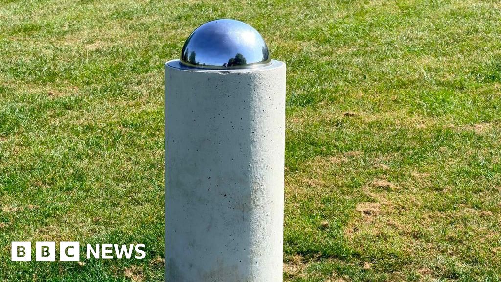 Village solar system model shows planets and stars