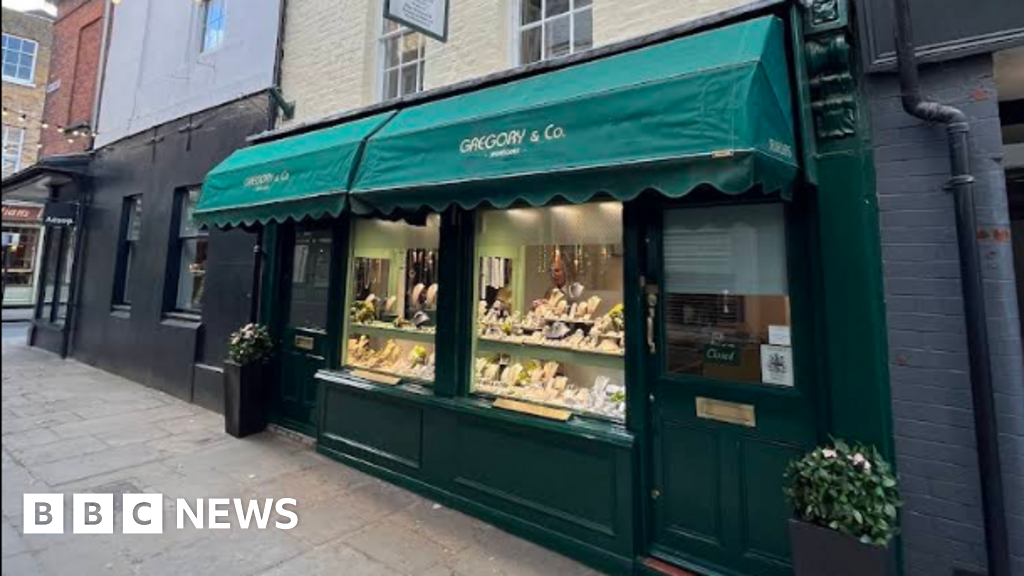 Armed burglars raid jewellers in daytime break-in