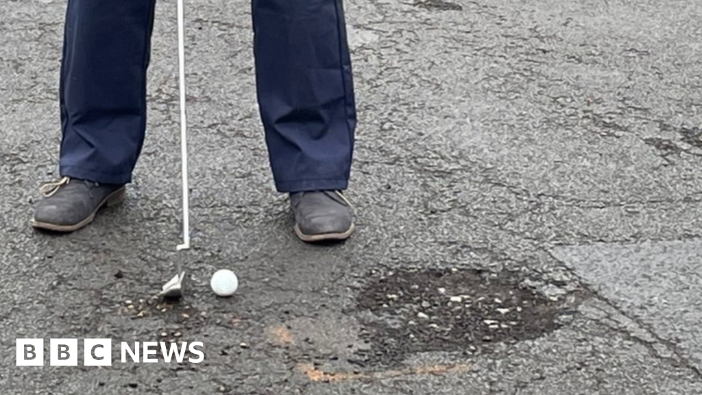 LeighonSea Roads campaigner plays golf in 'holes' on road BBC News