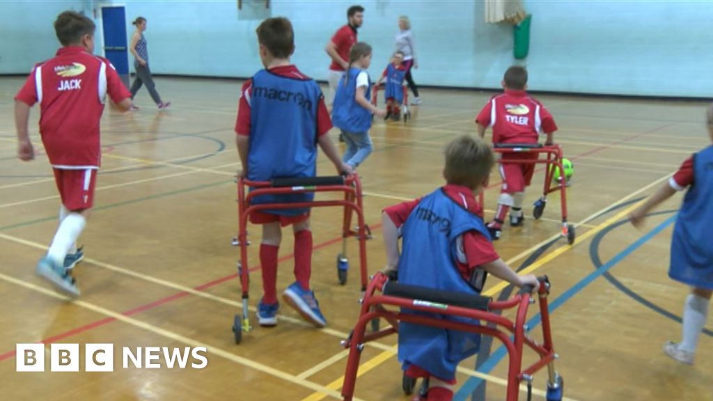 Club helps children with cerebral palsy play football BBC News