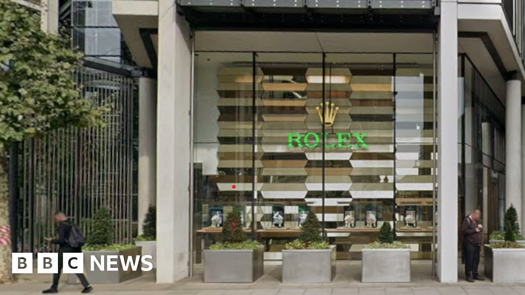 Machete-wielding robbers raid London Rolex shop