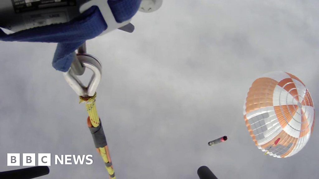 Rocket Lab Catches A Booster Returning From Space - BBC News