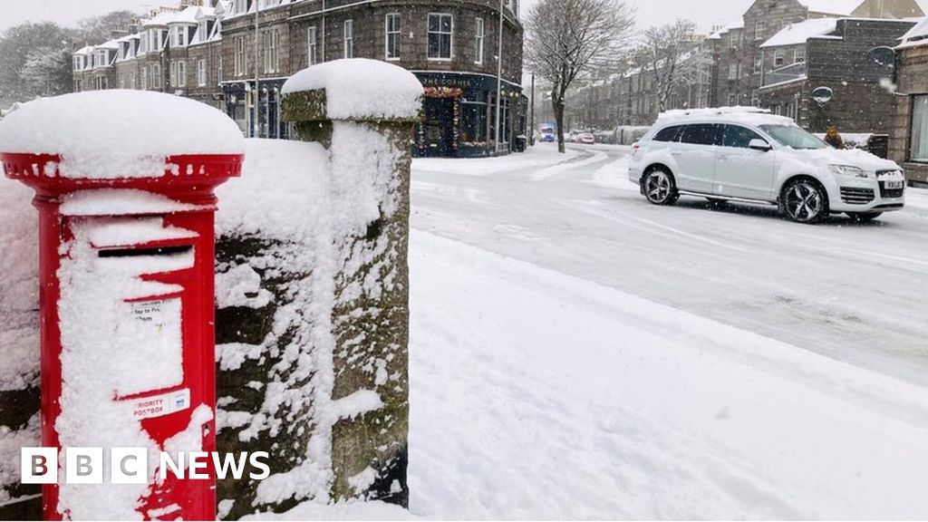 Snow closes schools and causes travel problems
