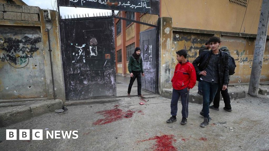 Syria war: Artillery fire kills nine at school in rebel-held Idlib