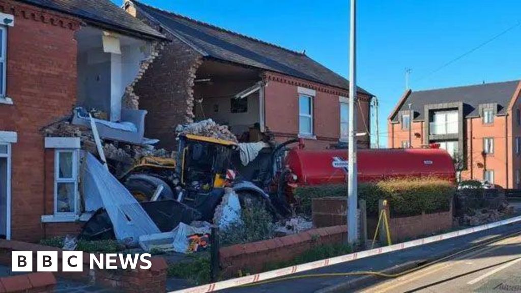 Watch: Moment tractor swerves off road into homes