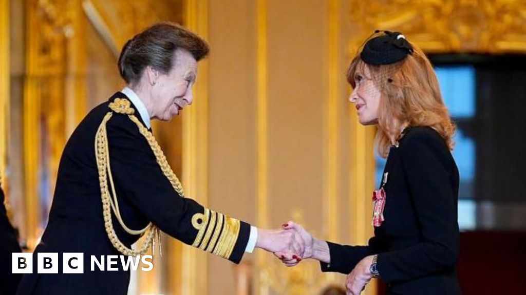 Jackie Bird accepts MBE from Princess Royal at Windsor Castle