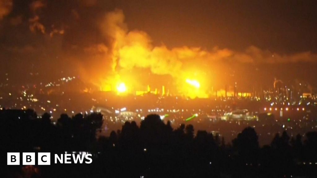 Watch: Massive oil refinery fire turns night skies orange over Los Angeles