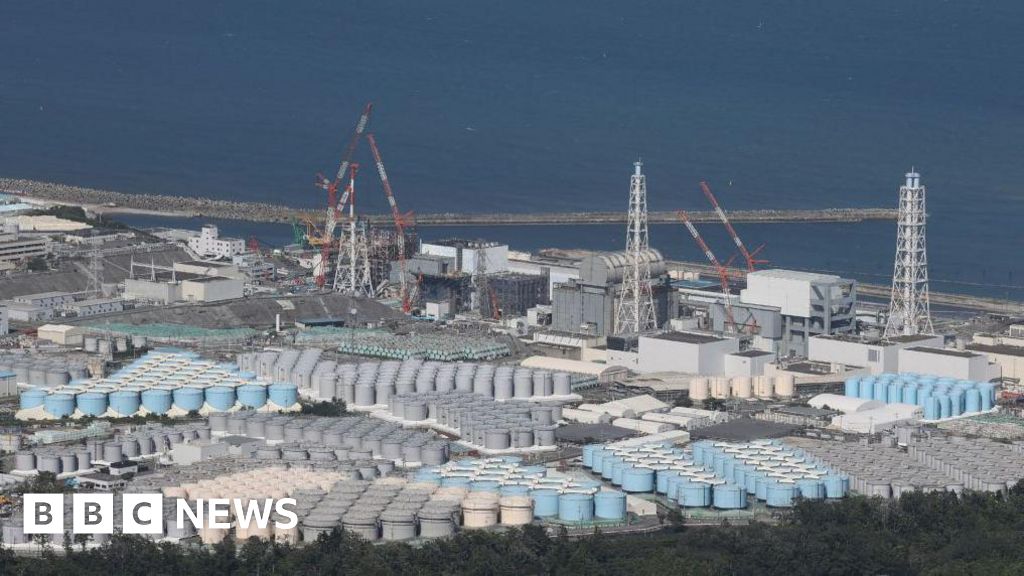 Japan's Fukushima plant workers evacuate after tsunami warning