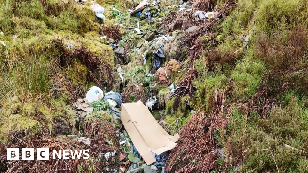 Drone footage shows 'devastating' fly-tipping on mountainside