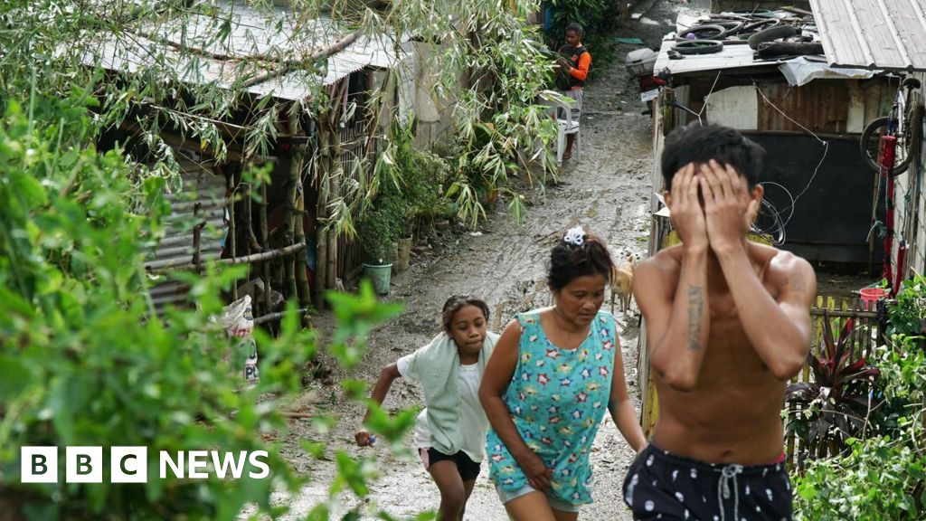 Typhoon moves away from Philippines after killing two