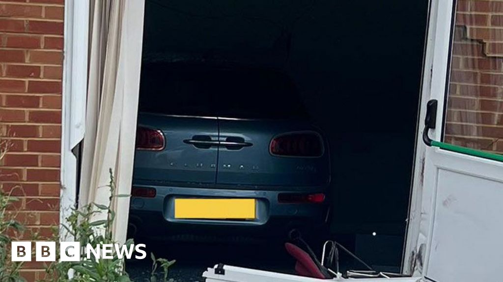 Car Crashes Into Suffolk Building, One Treated