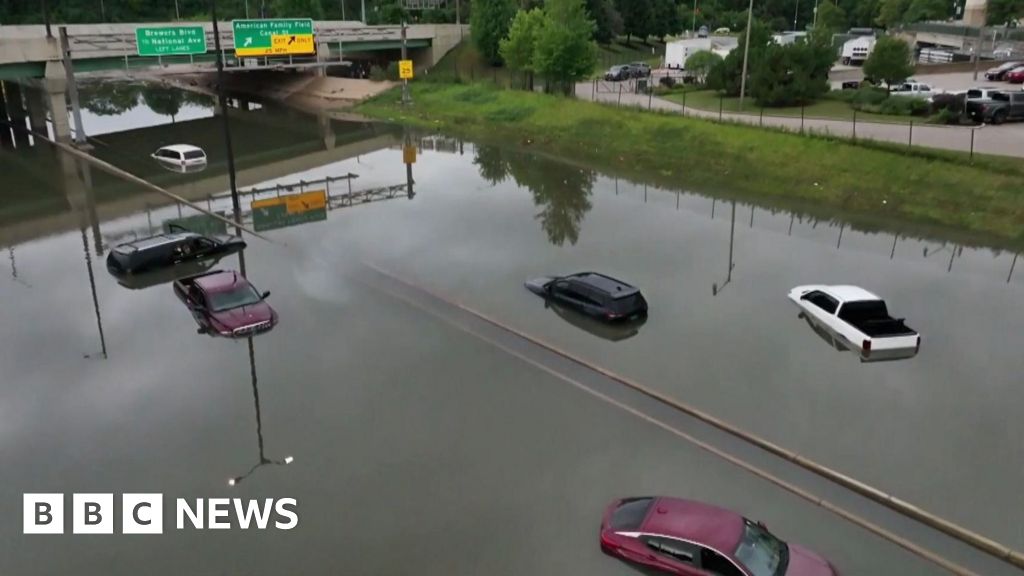 Watch: Cars submerged in flood waters after historic rain hits Wisconsin