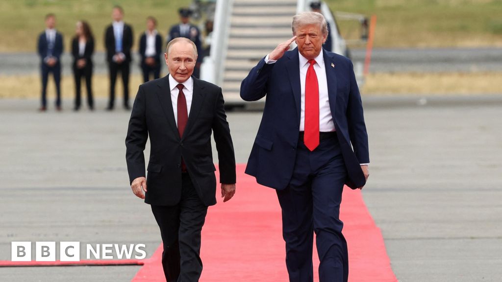 Watch: The moment Trump and Putin meet on the red carpet