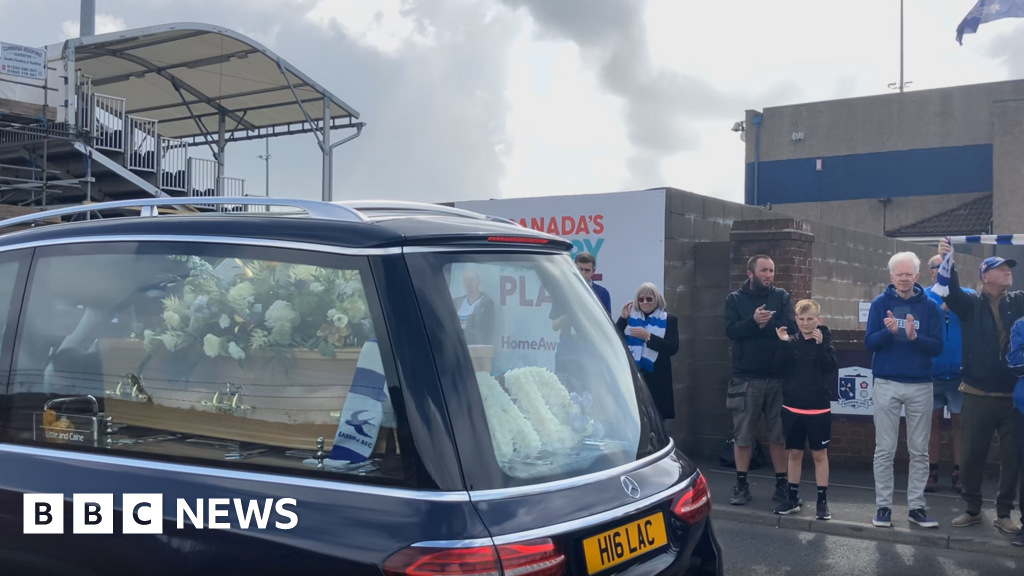 rewrite this title Fans gather for funeral of Barrow AFC life president Brian Keen