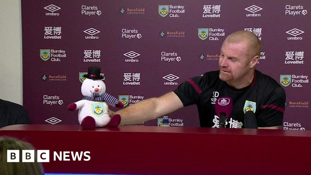 Burnley manager Sean Dyche joined by snowman at news conference