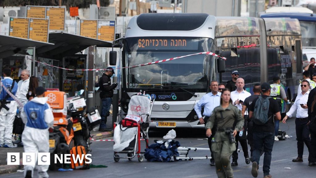Six killed by Palestinian gunmen at Jerusalem bus stop