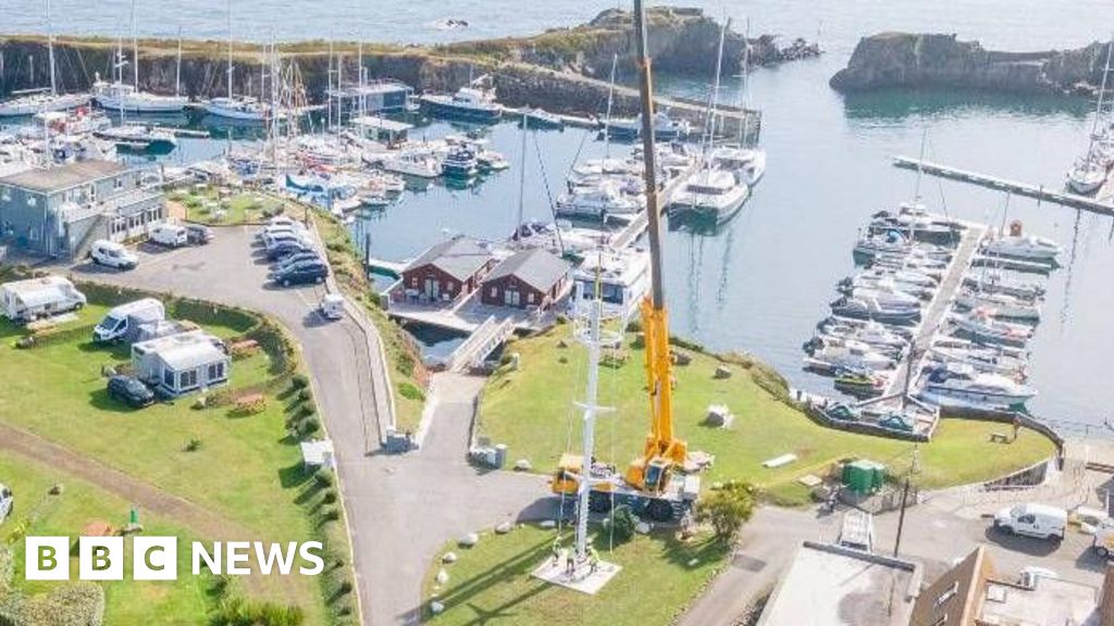 Guernsey mobile tower is designed to look like a yacht mast BBC News