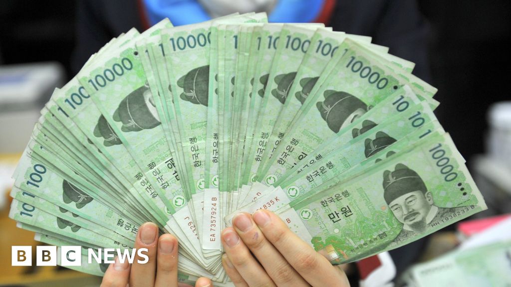 south-korea-s-currency-slides-on-surprise-rate-cut-bbc-news